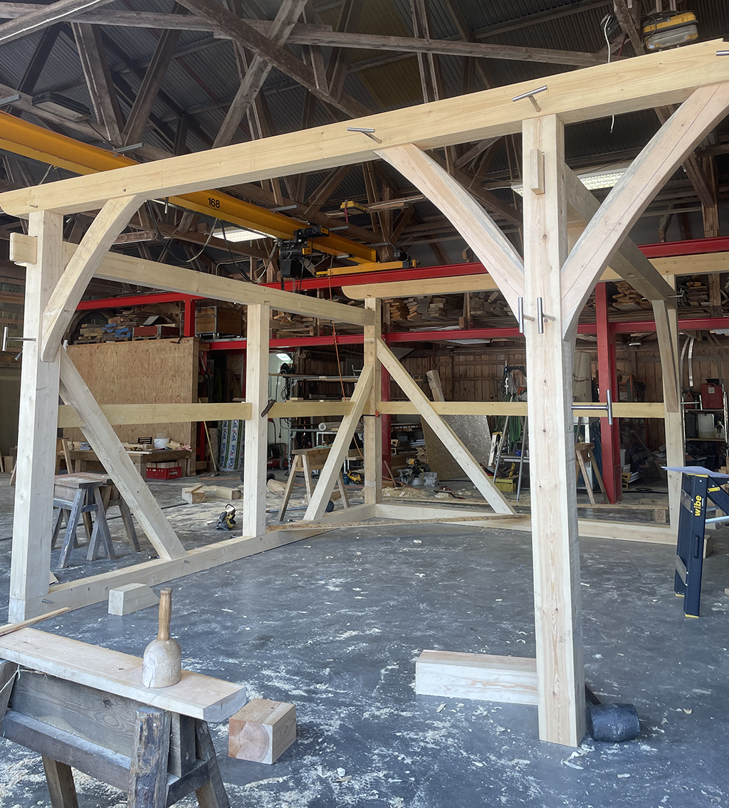 Carport i stolpverksbygge